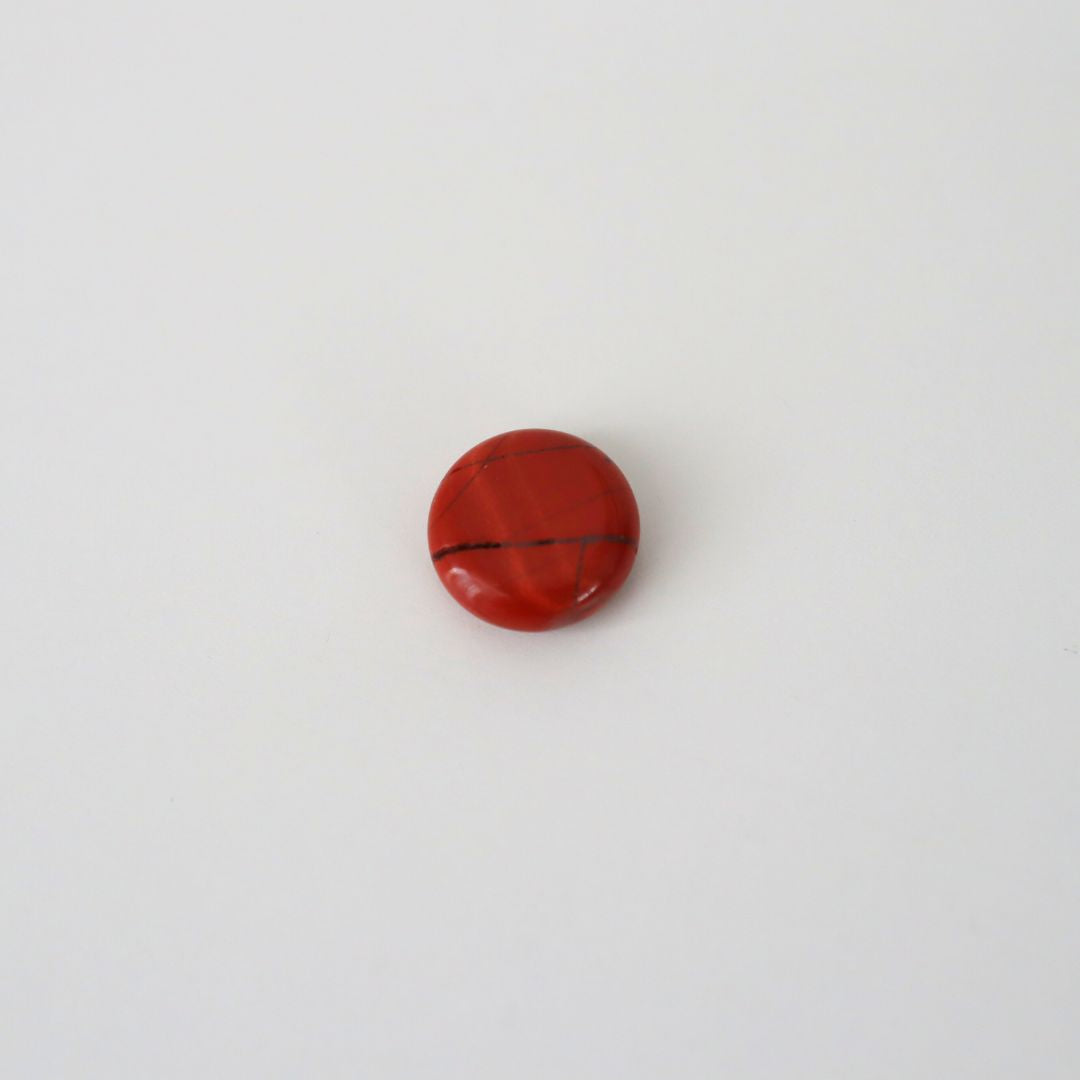 Red Jasper pocket crystal for Alma bralettes.